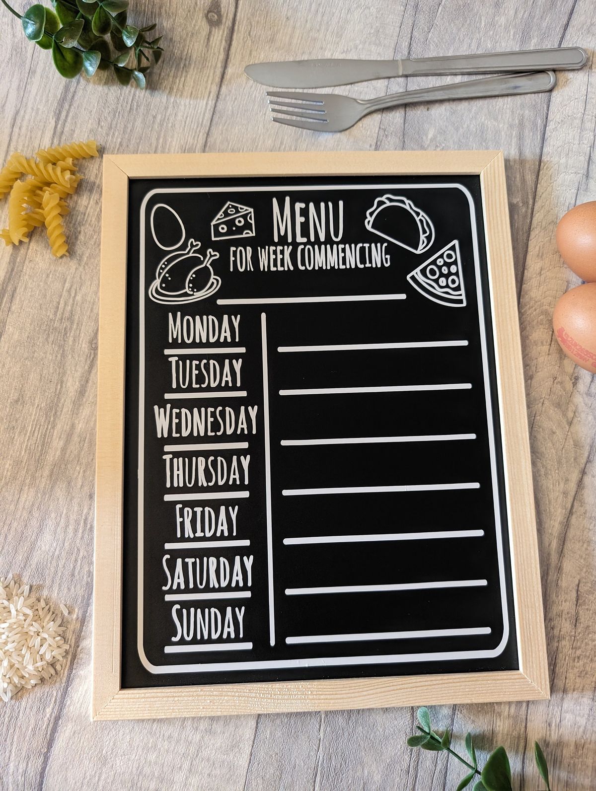 Meal planning board with weekly slots and ingredient notes